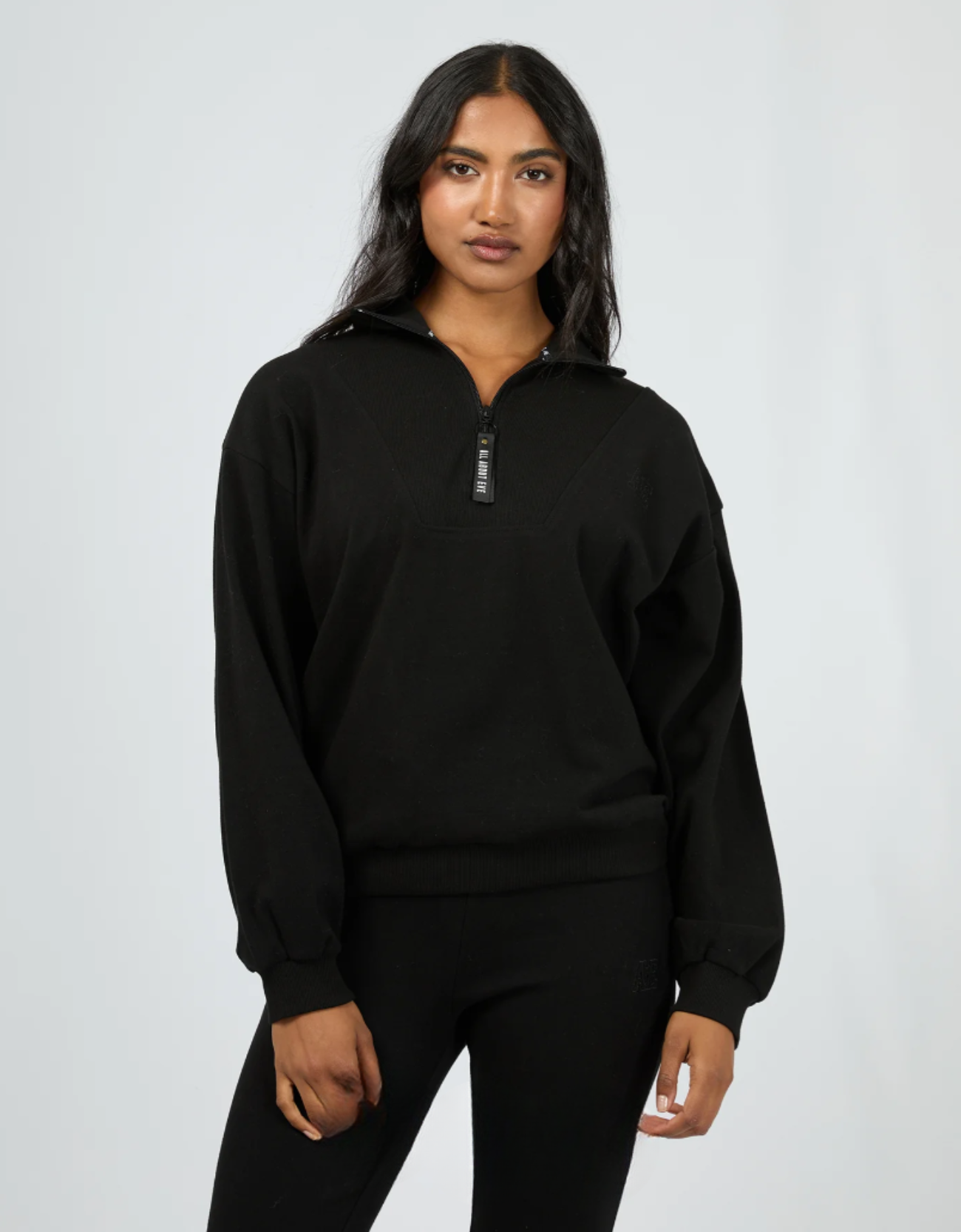 Balance 1/4 Zip Sweater by All About Eve in black