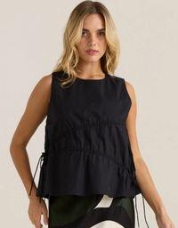 Sass Elin Gathered Tie Top in black, showing its round neckline, sleeveless cut and gathered front with side ties.