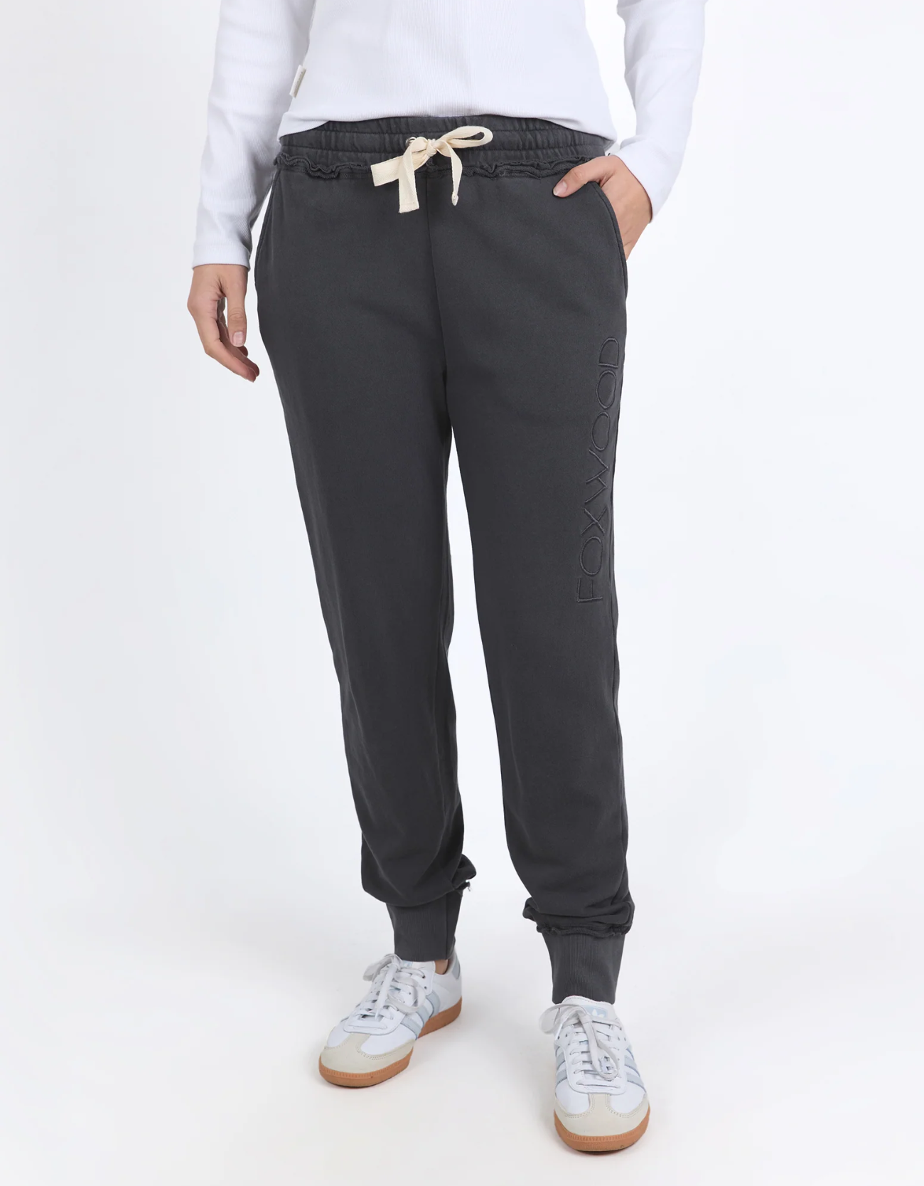 Simplified Track Pant - Coal is a classic track pant featuring Foxwood logo