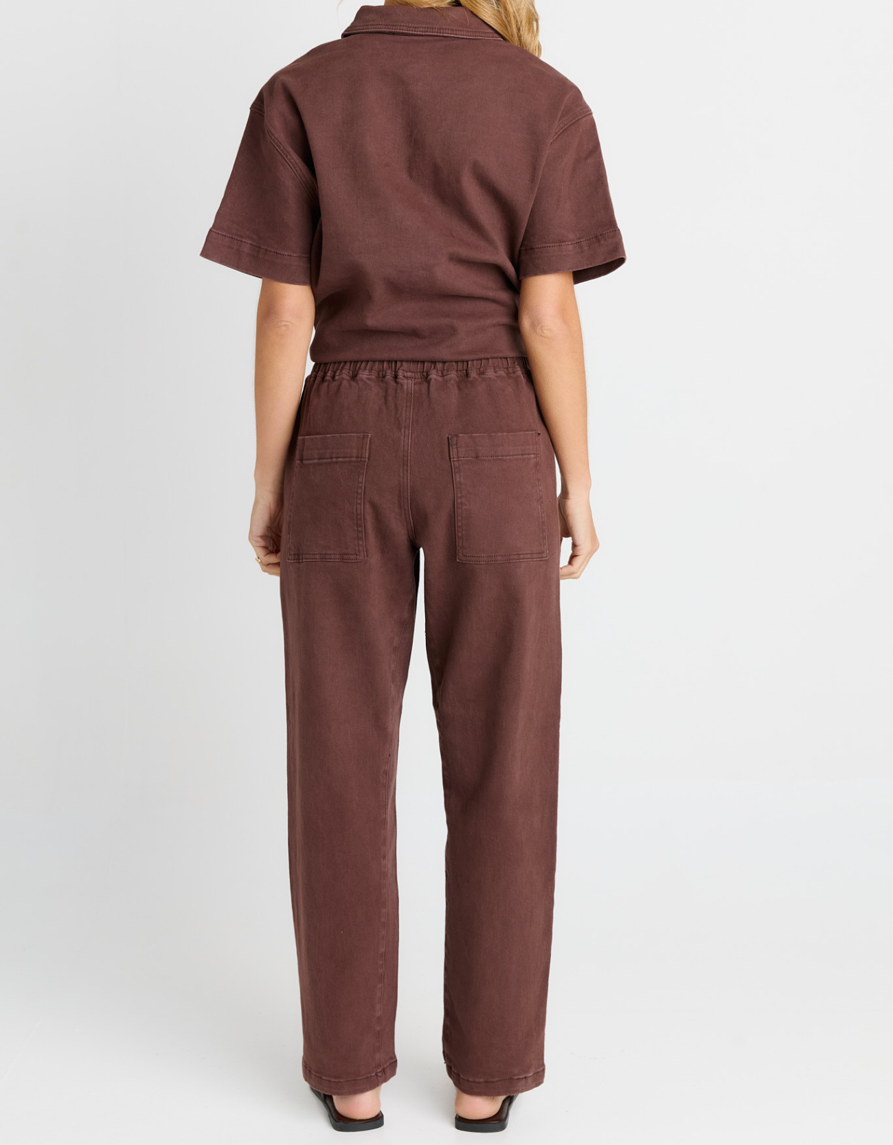 Betty Basics Quinn Cotton Jogger in Chocolate – back view showing relaxed straight leg, deep back pockets and elasticated waistband in chocolate cotton